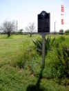 View of marker, looking southwest